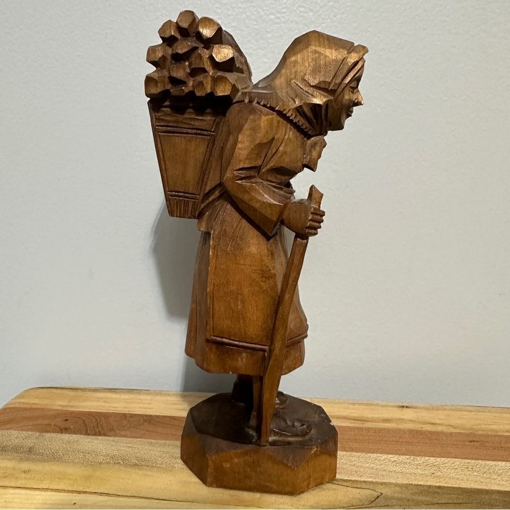 Hand carved wooden old woman